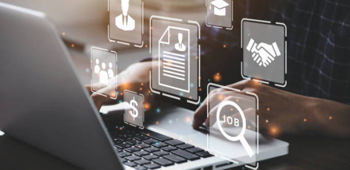 Human using a computer laptop for searching for job and fill out personal data on job website to file a resume and apply application to jobs on the internet. work search online concept.